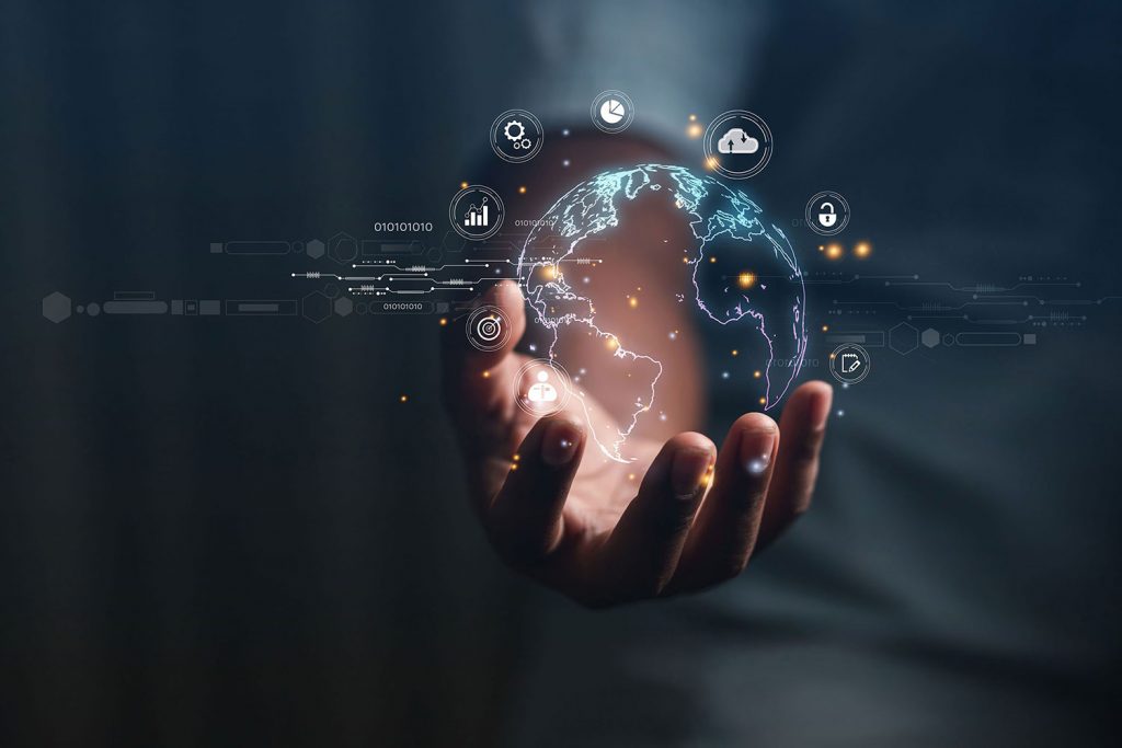 A man holding a three-dimensional digital planet, displaying futuristic digital graphic elements.